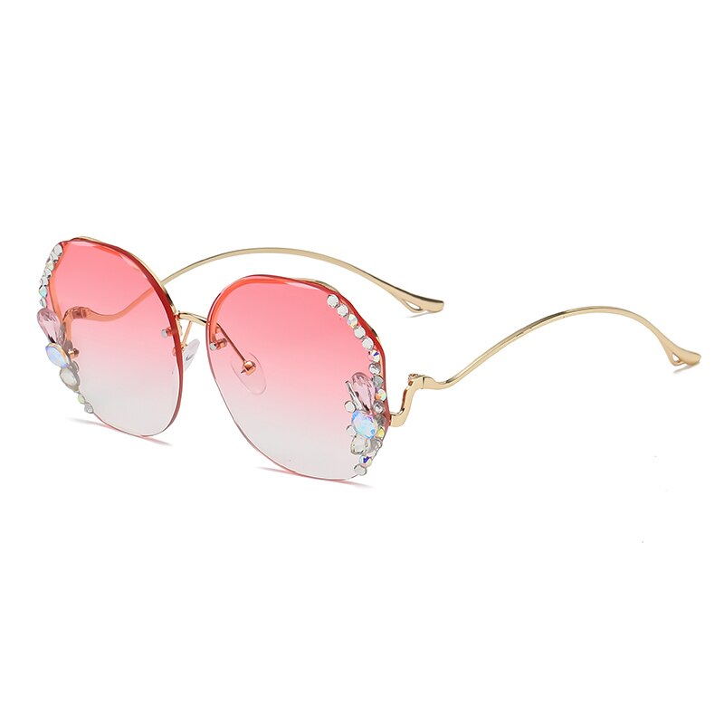 Occhiali da sole con diamanti di alta qualità Donna UV400 Occhiali da sole con lenti sfumate con strass Designer Occhiali da sole vintage Oculos Gafas con scatola