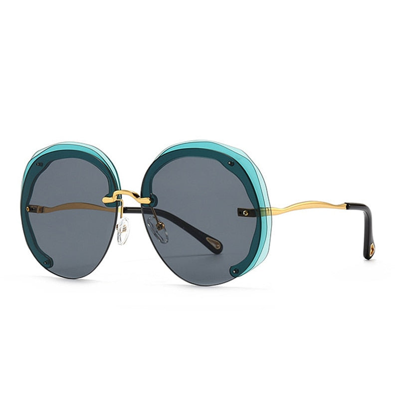 Prodotti SHAUNA Fashion Oversize Occhiali da sole rotondi senza montatura Donna Clear Ocean Gradient Lens Shades UV400 Occhiali da sole da uomo di tendenza