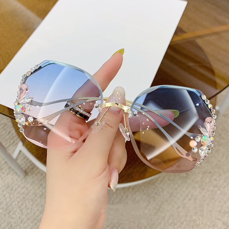 Occhiali da sole con diamanti di alta qualità Donna UV400 Occhiali da sole con lenti sfumate con strass Designer Occhiali da sole vintage Oculos Gafas con scatola