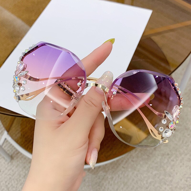 Occhiali da sole con diamanti di alta qualità Donna UV400 Occhiali da sole con lenti sfumate con strass Designer Occhiali da sole vintage Oculos Gafas con scatola