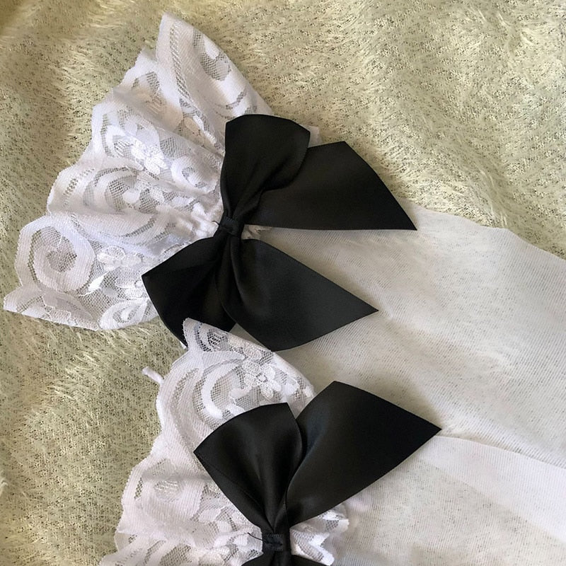 Calzini lunghi sexy di Bowknot bianco nero Calzini alti da donna sopra il ginocchio Calze sopra le calze al ginocchio per calze al ginocchio Lolita da donna